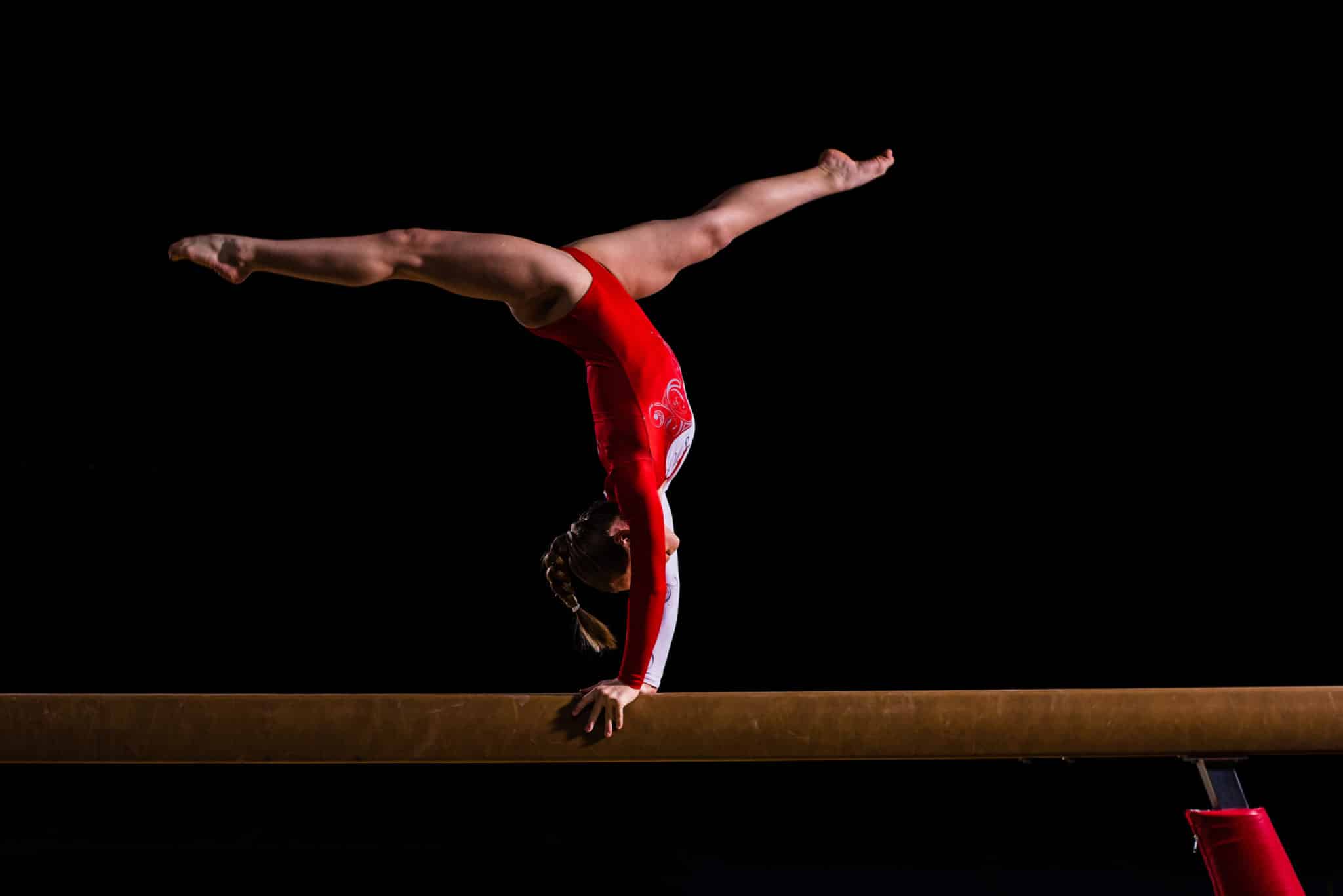 Female gymnast balancing